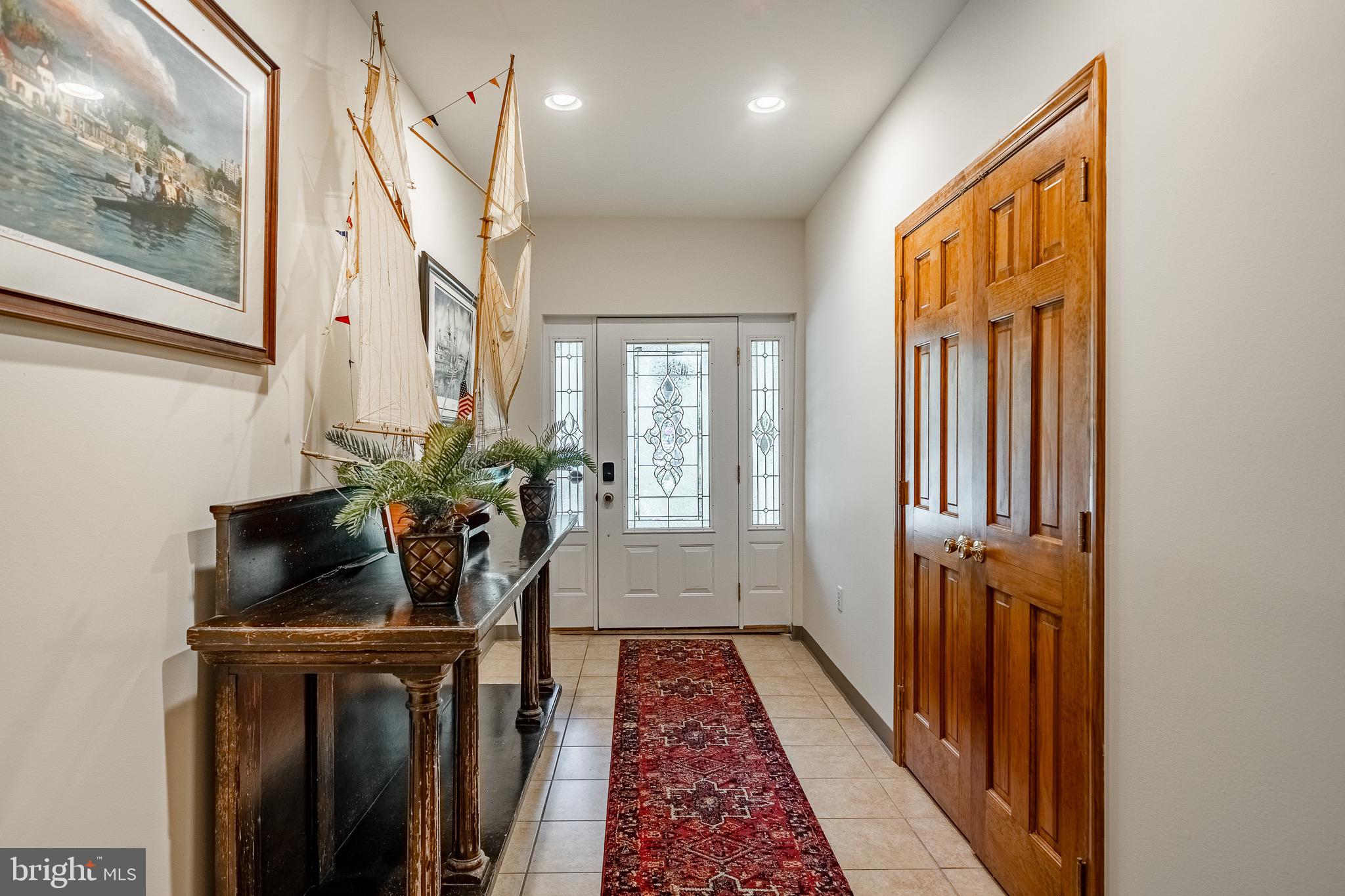 2 River Road Philadelphia, PA 19128 - Photo 5 of 46 a view of hallway with wooden floor and stairs