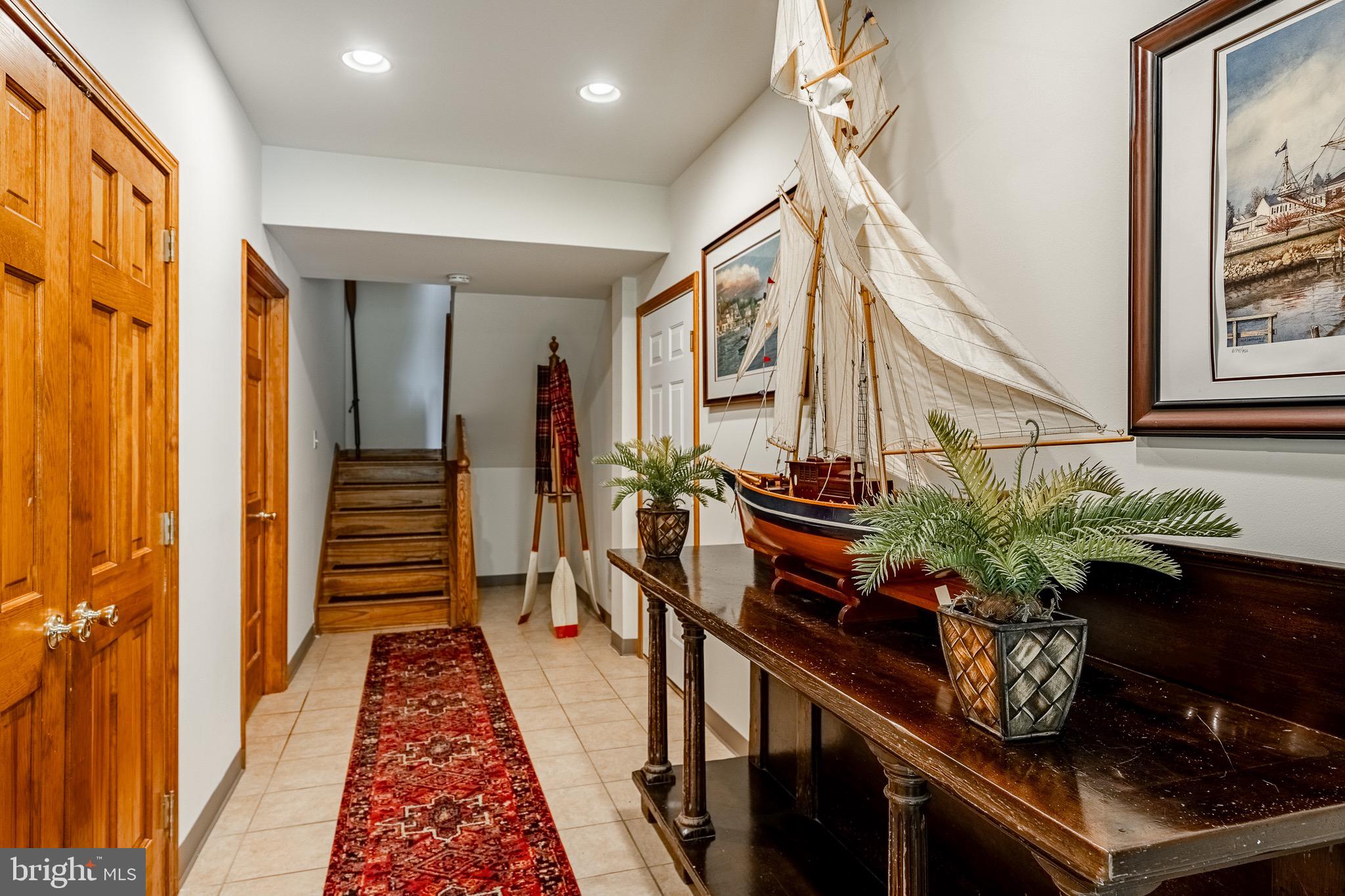 2 River Road Philadelphia, PA 19128 - Photo 6 of 46 a hallway with dining table and chairs