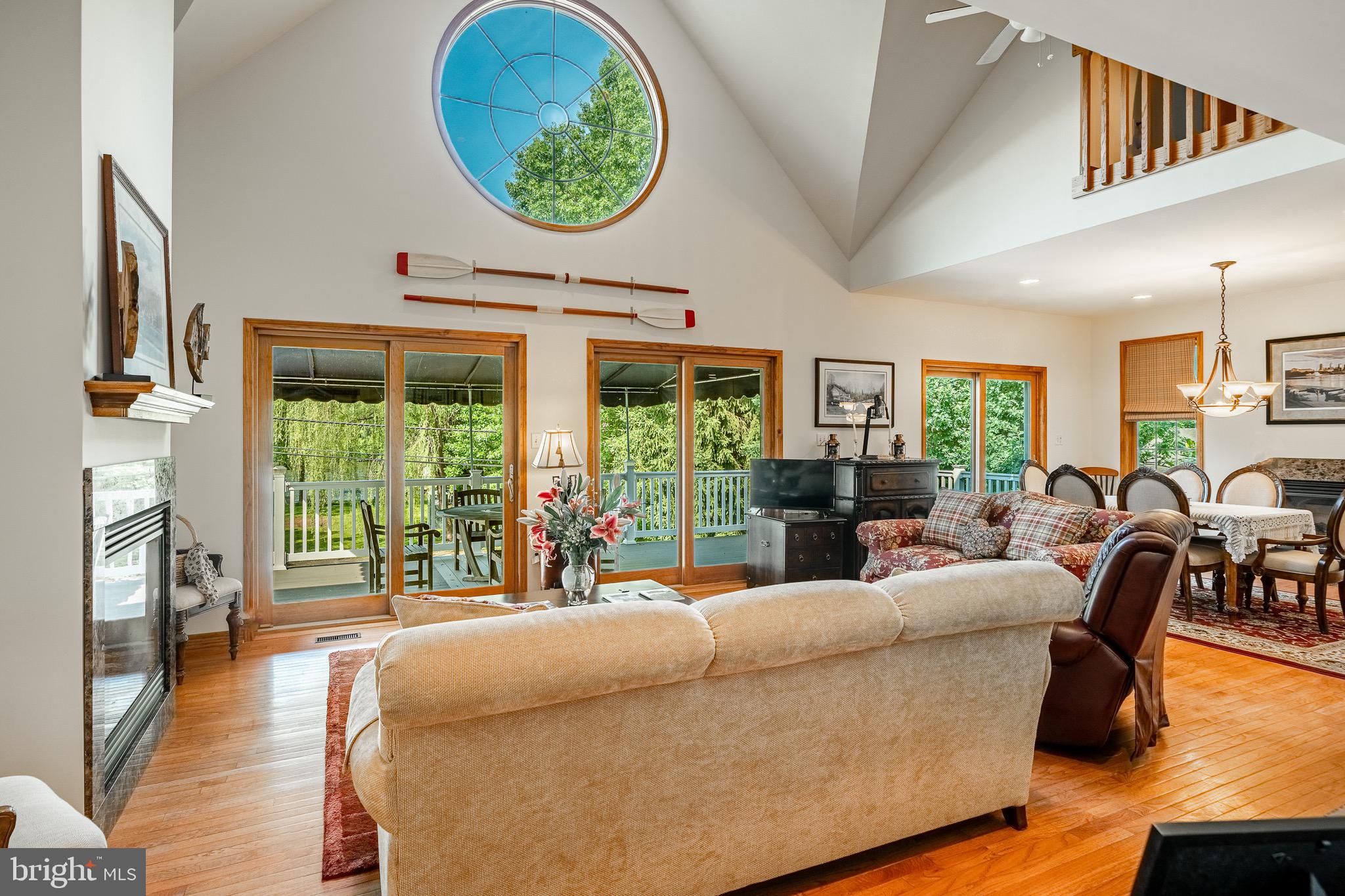 2 River Road Philadelphia, PA 19128 - Photo 7 of 46 a living room with fireplace furniture and a large window