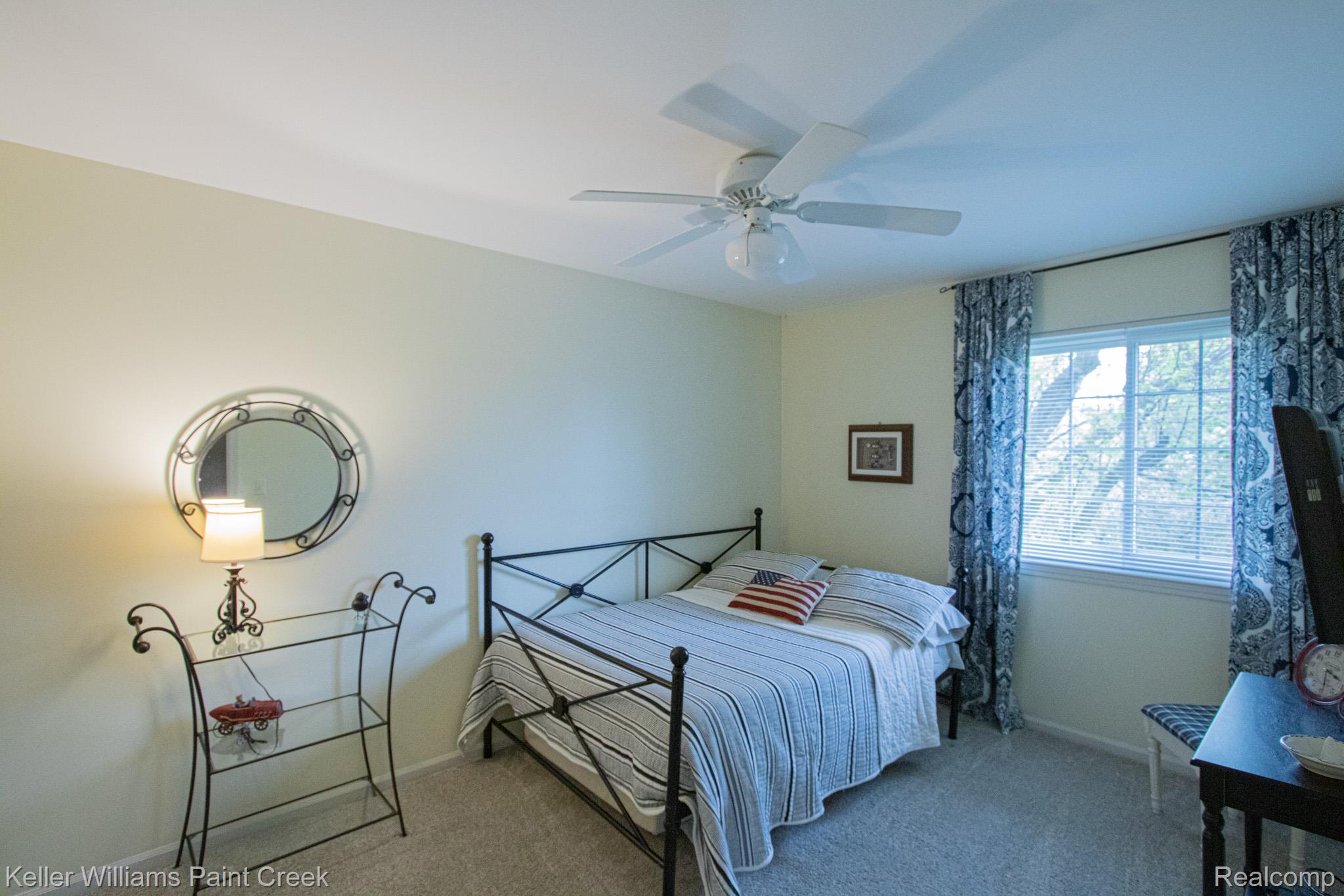 70696 Mellen Street Romeo, MI 48065 - Photo 30 of 46 Bedroom with ceiling fan and light colored carpet