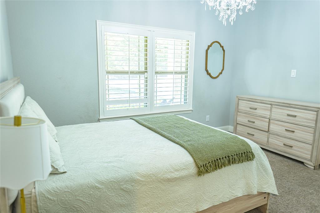 1012 Bowers Road Seagoville, TX 75159 - Photo 18 of 26 a bedroom with a bed and a window