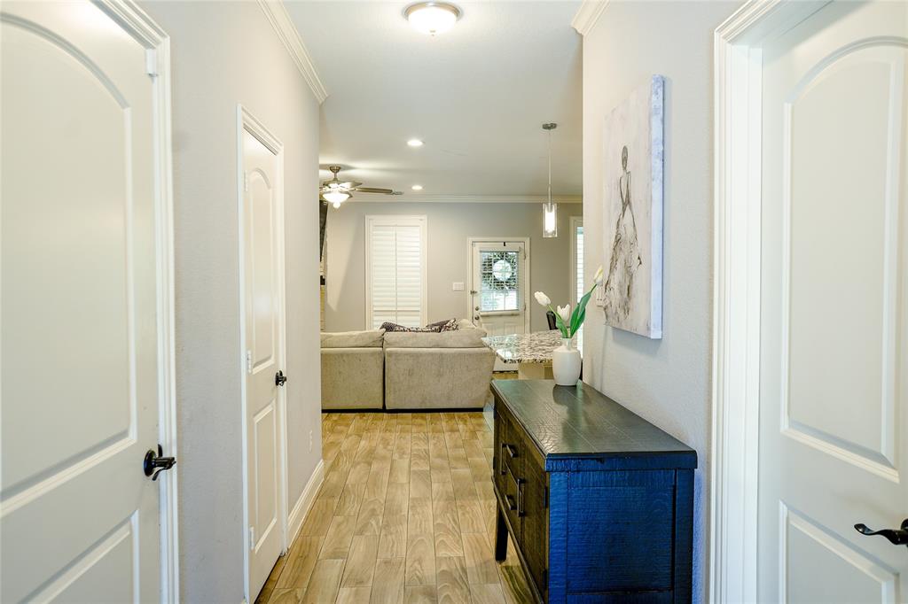 1012 Bowers Road Seagoville, TX 75159 - Photo 10 of 26 a bathroom with a sink a mirror and a shower