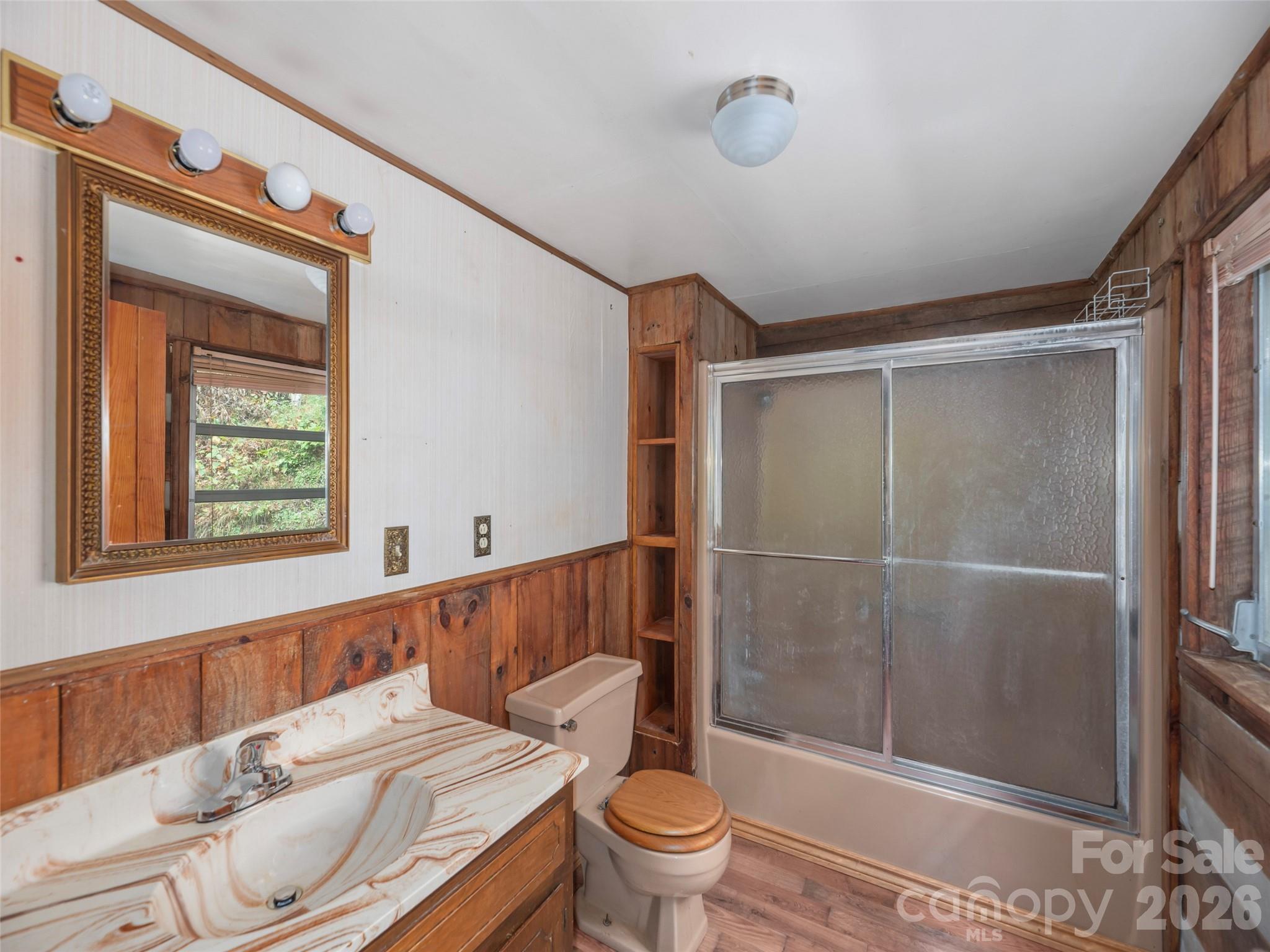 775 Chambers Cove Road Canton, NC 28716 - Photo 15 of 28 a bathroom with a sink toilet and shower