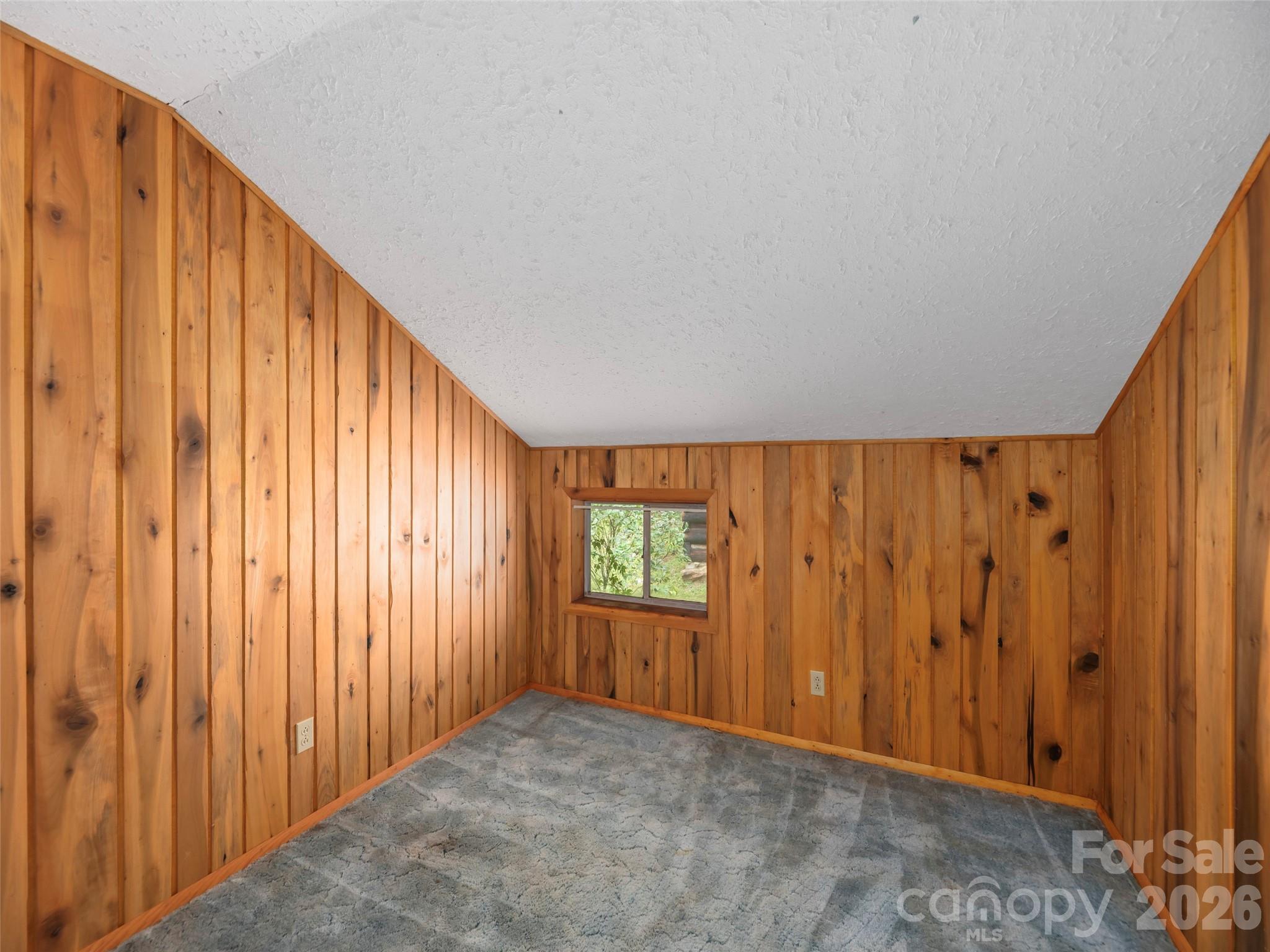 775 Chambers Cove Road Canton, NC 28716 - Photo 16 of 28 a view of an empty room and window