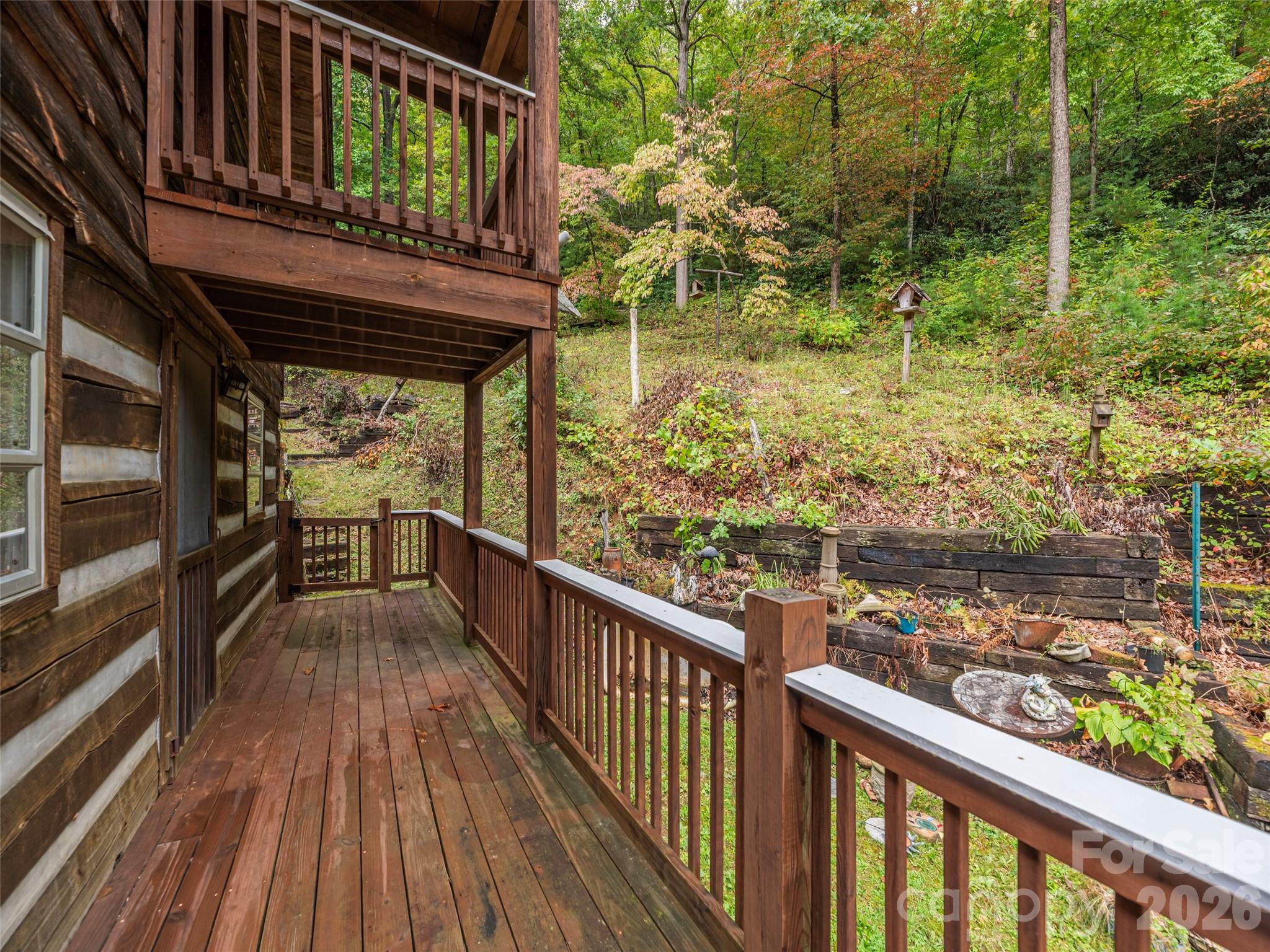 775 Chambers Cove Road Canton, NC 28716 - Photo 21 of 28 a view of a balcony with wooden floor