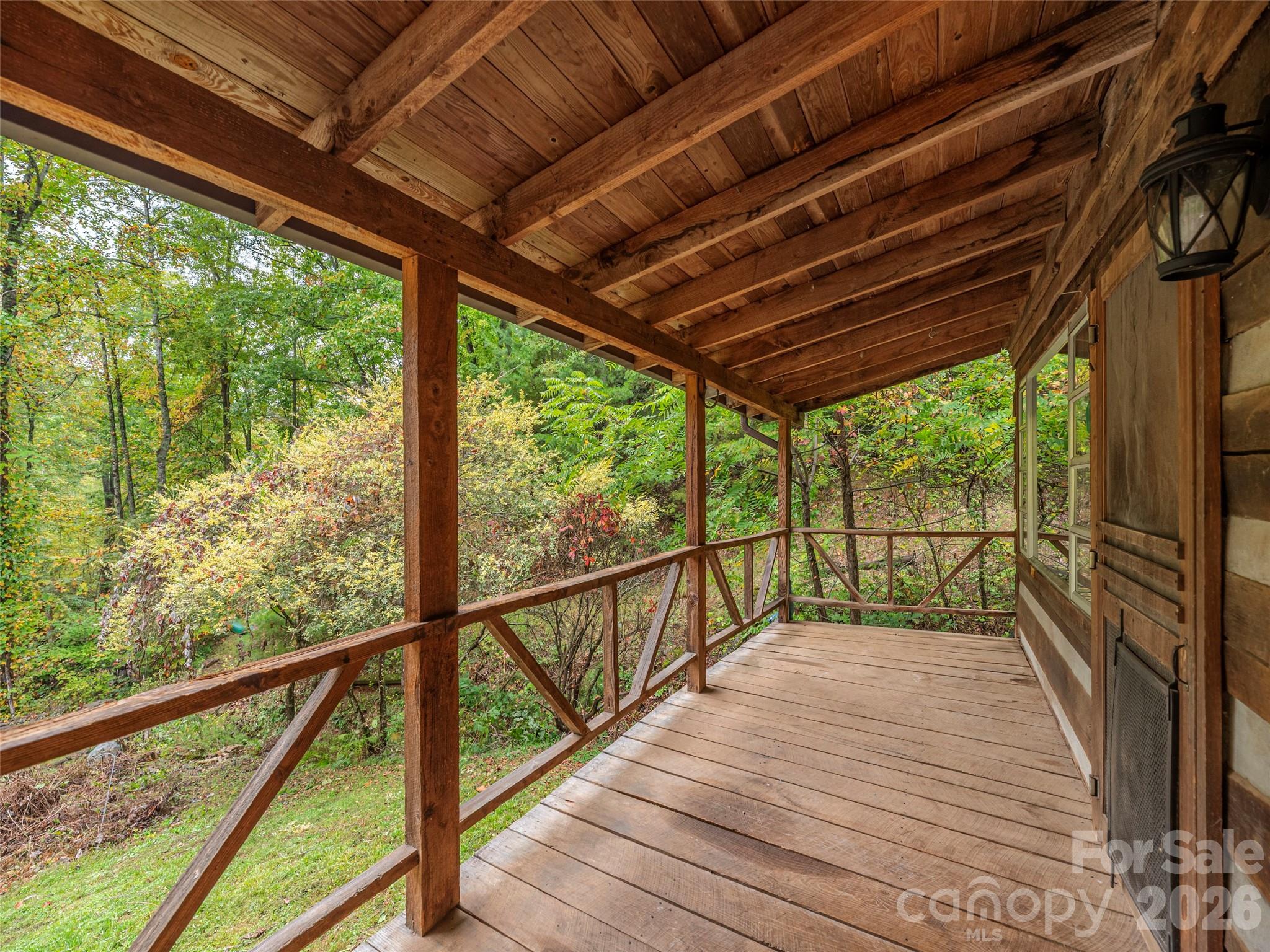 775 Chambers Cove Road Canton, NC 28716 - Photo 4 of 28 a view of balcony with wooden floor