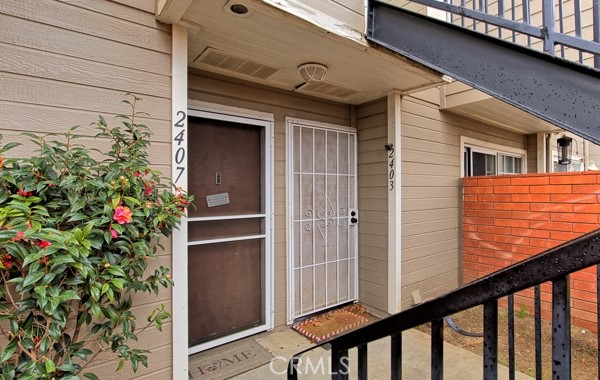 a view of a balcony with a potted plant