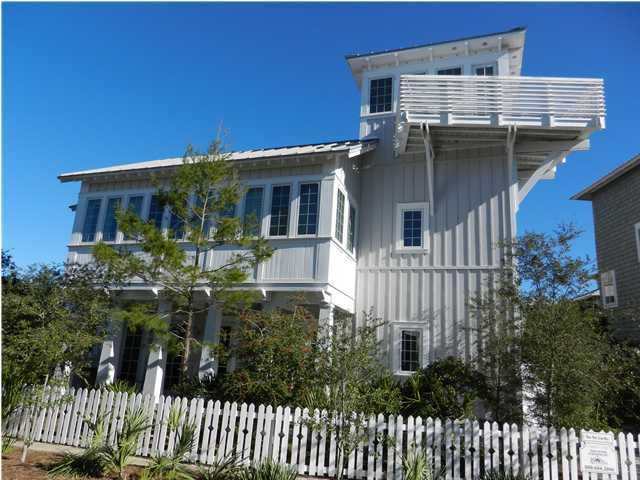 13 Chelsea Loop Road Santa Rosa Beach, FL 32459 - Photo 1 of 19 a front view of a house with a garden