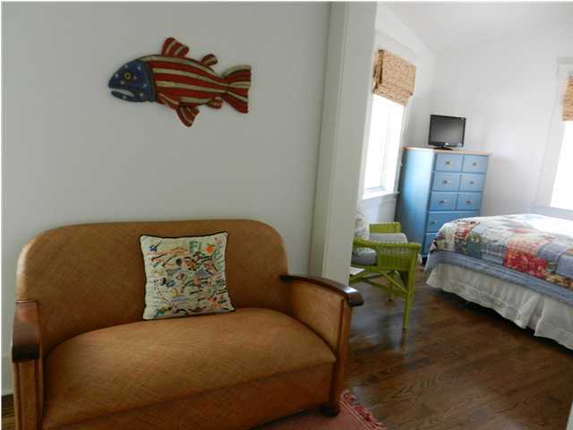 13 Chelsea Loop Road Santa Rosa Beach, FL 32459 - Photo 15 of 19 a bedroom with a bed and wooden floor