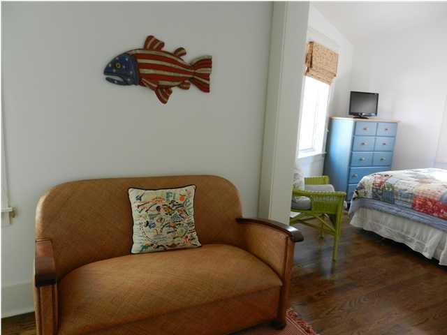 13 Chelsea Loop Road Santa Rosa Beach, FL 32459 - Photo 17 of 19 a bedroom with a bed and wooden floor
