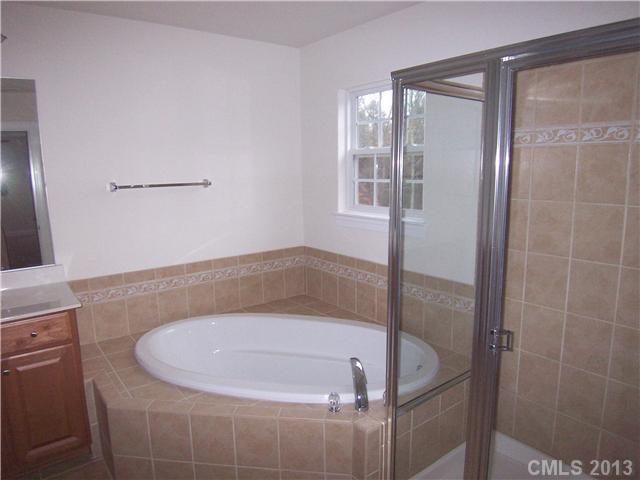 289 Lorraine Road Fort Mill, SC 29708 - Photo 12 of 16 a bathroom with a shower