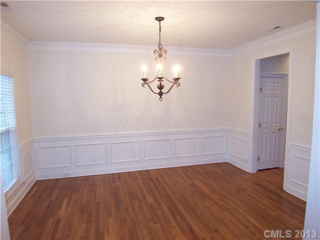 289 Lorraine Road Fort Mill, SC 29708 - Photo 3 of 16 a view of a room with wooden floor and fan