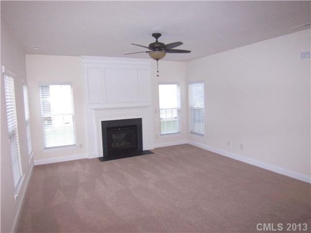 289 Lorraine Road Fort Mill, SC 29708 - Photo 7 of 16 a view of empty room with a fireplace