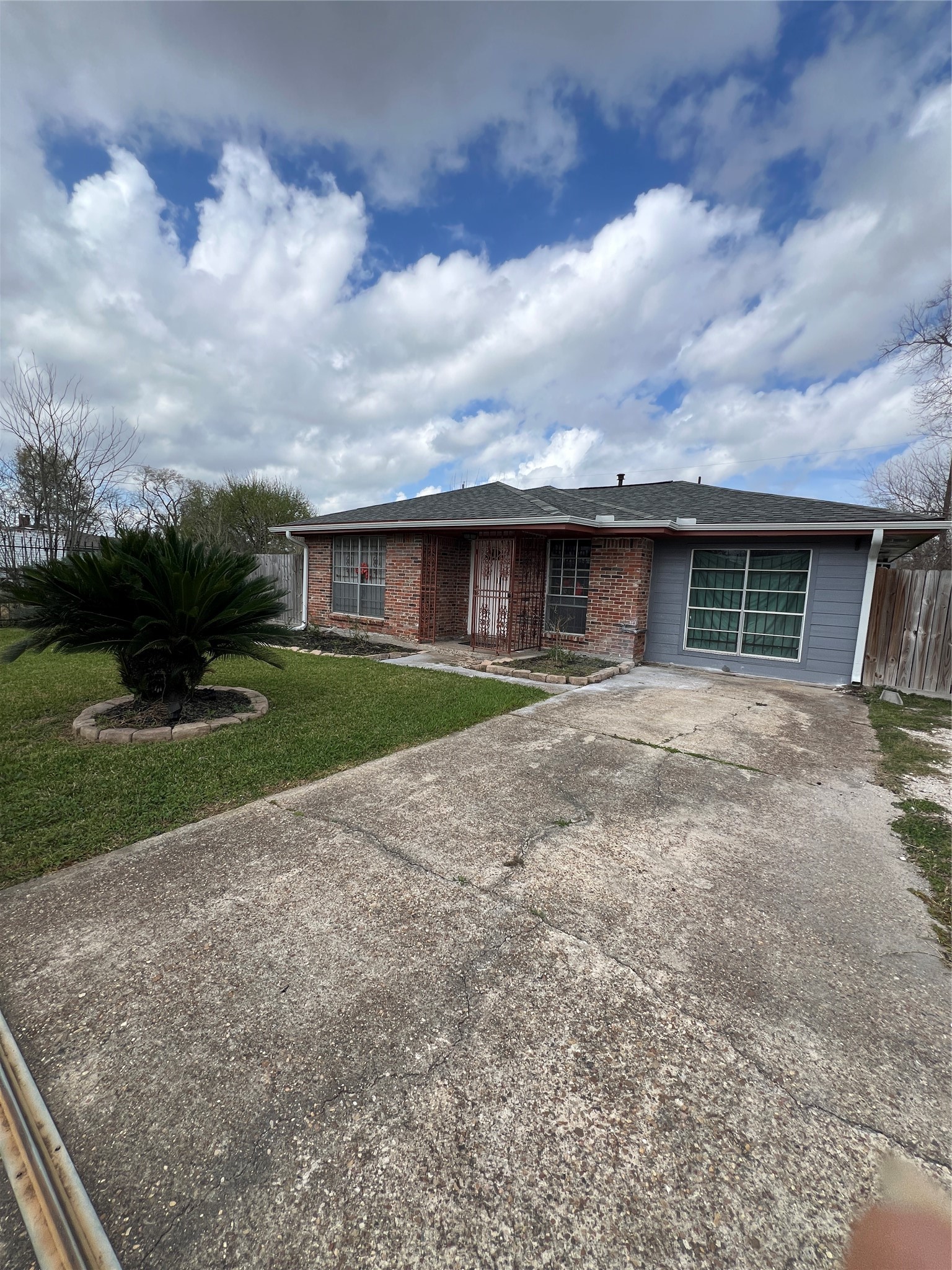 3613 Sparrow Street Houston, TX 77051 - Photo 4 of 10 a view of a house with a yard