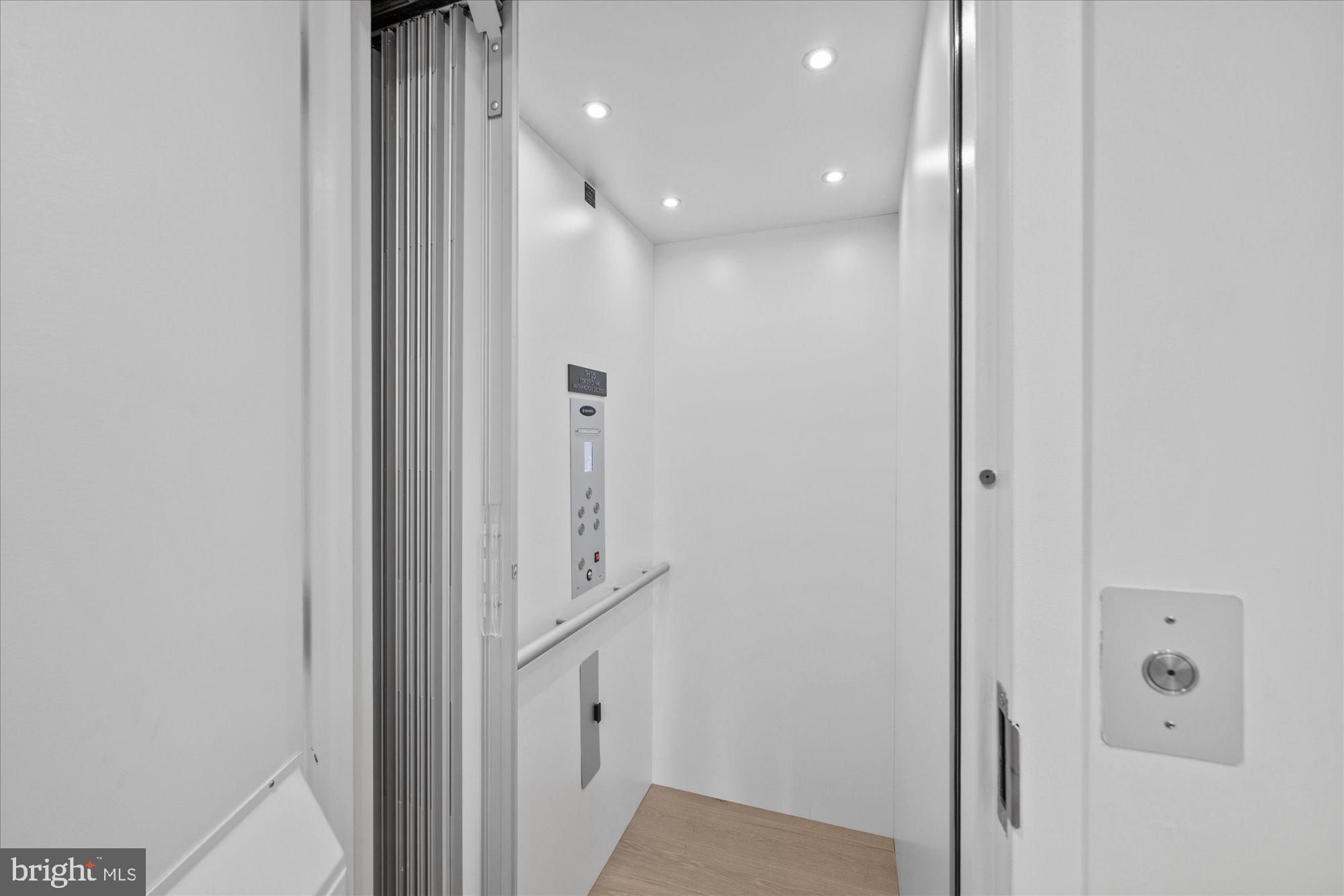 1336 8th Street Northwest, Unit TH5 Washington, DC 20001 - Photo 19 of 32 a view of a hallway with white walls
