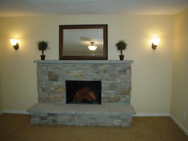 3656 West Birchfield Road Moxee, WA 98936 - Photo 16 of 31 a living room with a fireplace