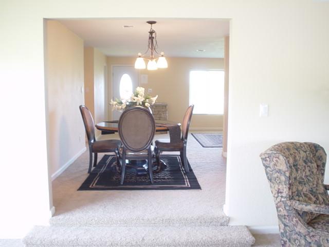 3656 West Birchfield Road Moxee, WA 98936 - Photo 17 of 31 a dining room with furniture and chandelier