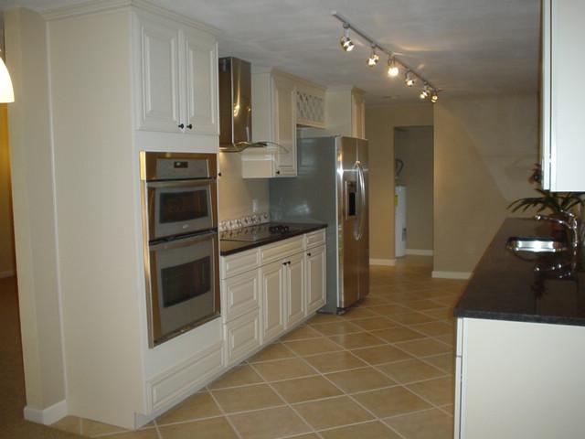 3656 West Birchfield Road Moxee, WA 98936 - Photo 3 of 31 a kitchen with stainless steel appliances a refrigerator and a stove