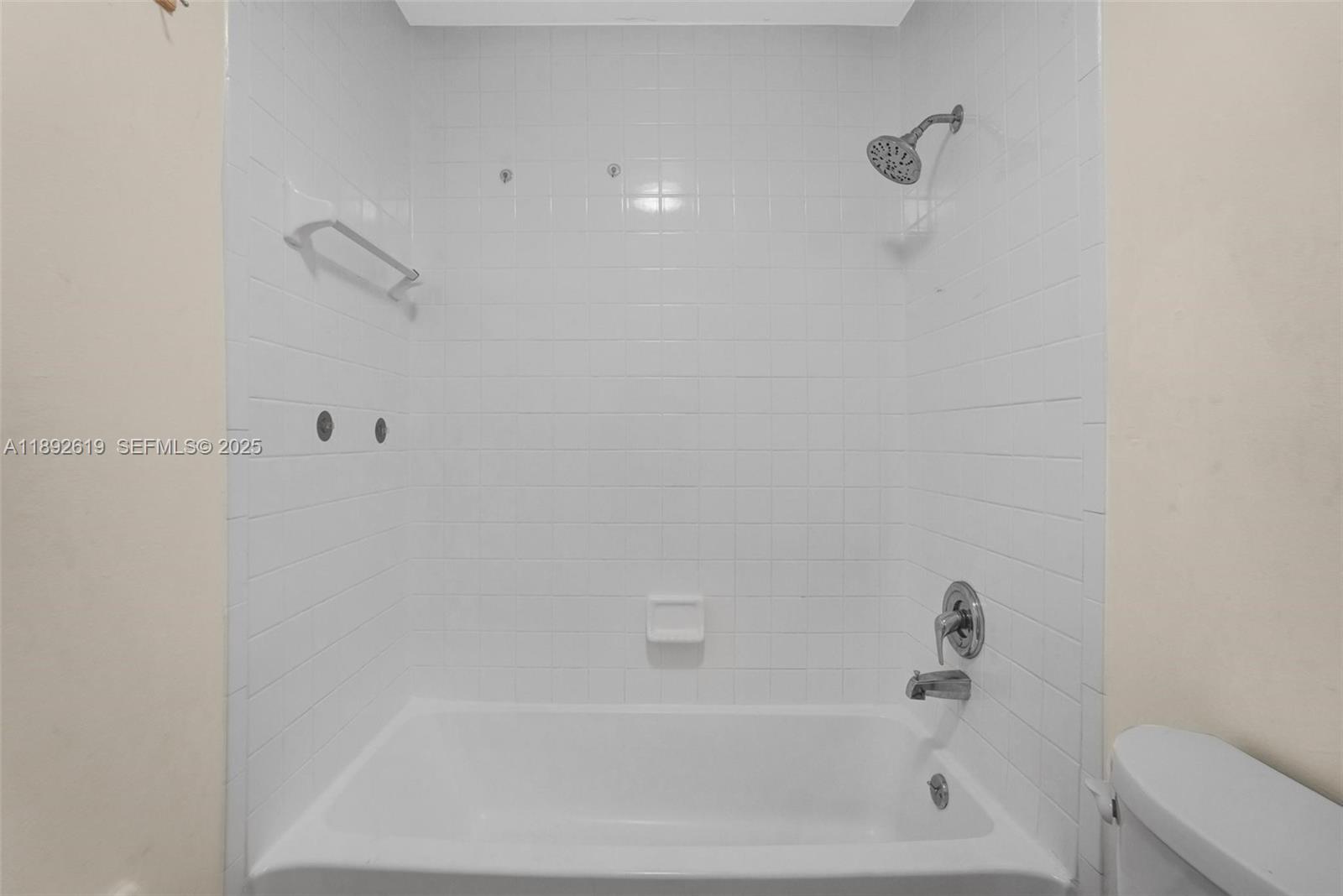 7785 West 30th Court, Unit F210 Hialeah, FL 33018 - Photo 14 of 21 a bathroom with a bathtub