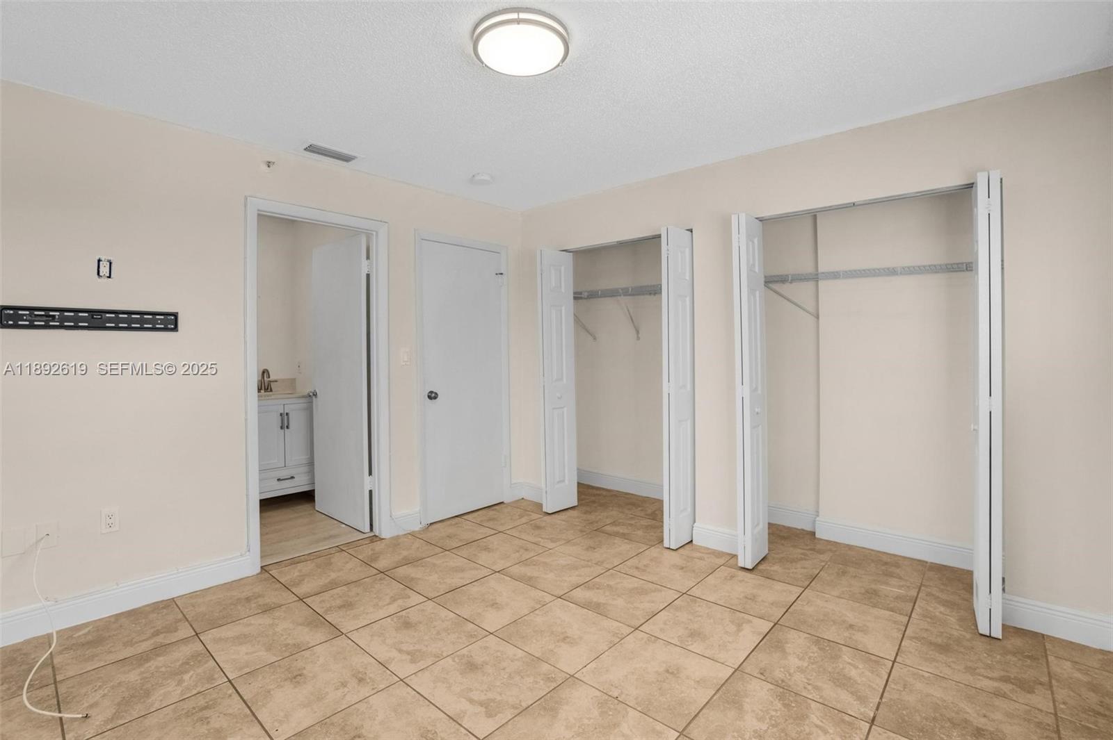 7785 West 30th Court, Unit F210 Hialeah, FL 33018 - Photo 7 of 21 a view of empty room