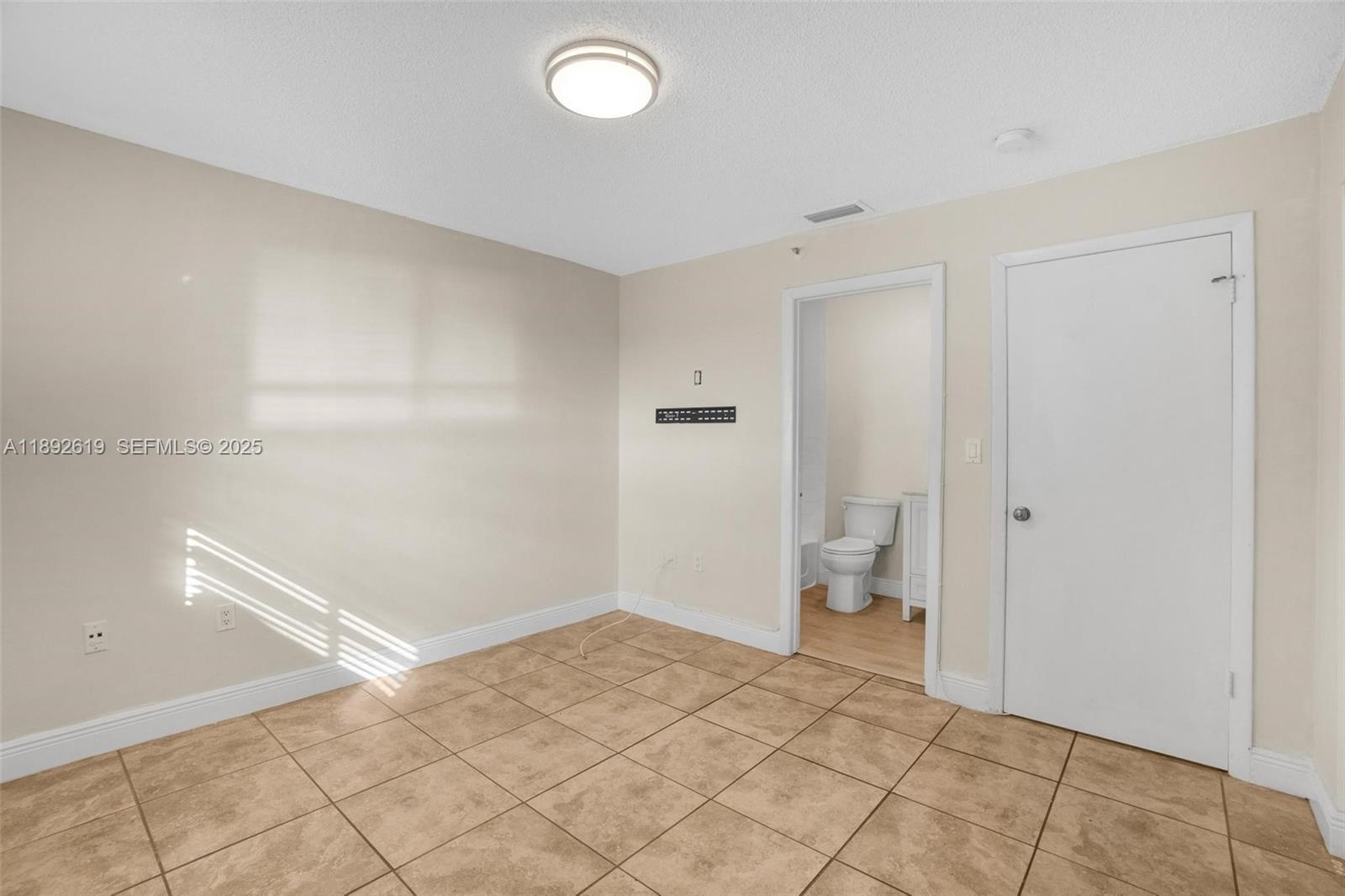 7785 West 30th Court, Unit F210 Hialeah, FL 33018 - Photo 8 of 21 a bathroom with a sink and a toilet