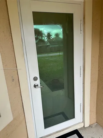 a bathroom with a shower and toilet