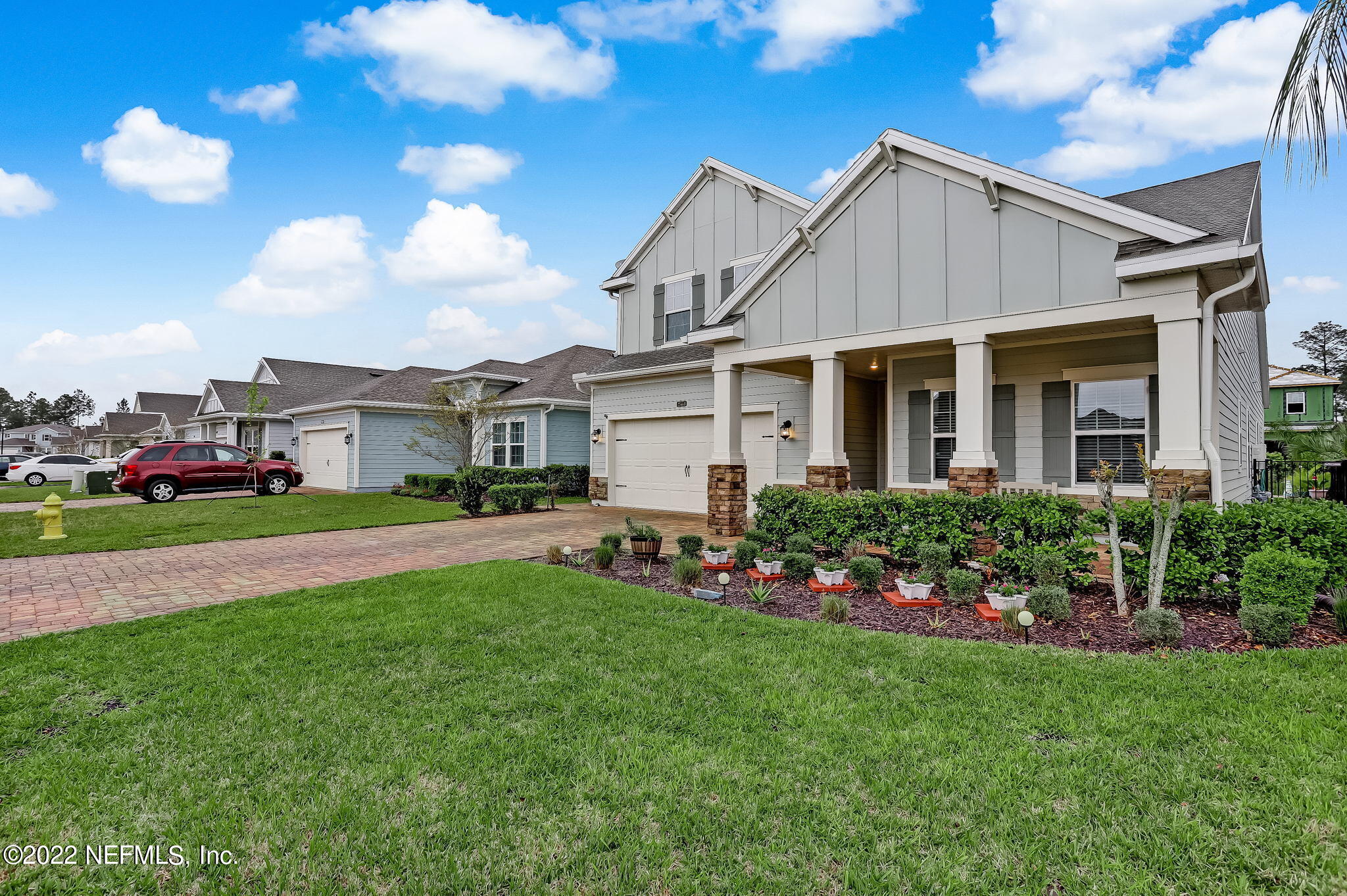 2564 Alexia Circle Jacksonville, FL 32246 - Photo 2 of 67 a front view of house with yard and green space