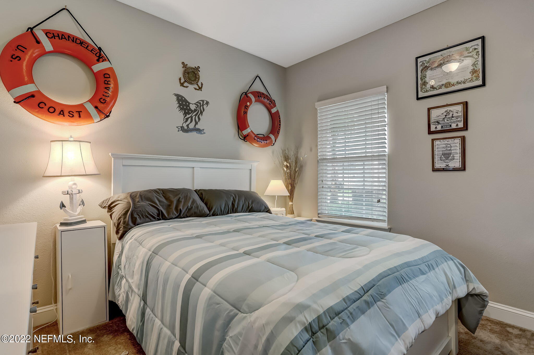 2564 Alexia Circle Jacksonville, FL 32246 - Photo 36 of 67 a bedroom with a bed and a window