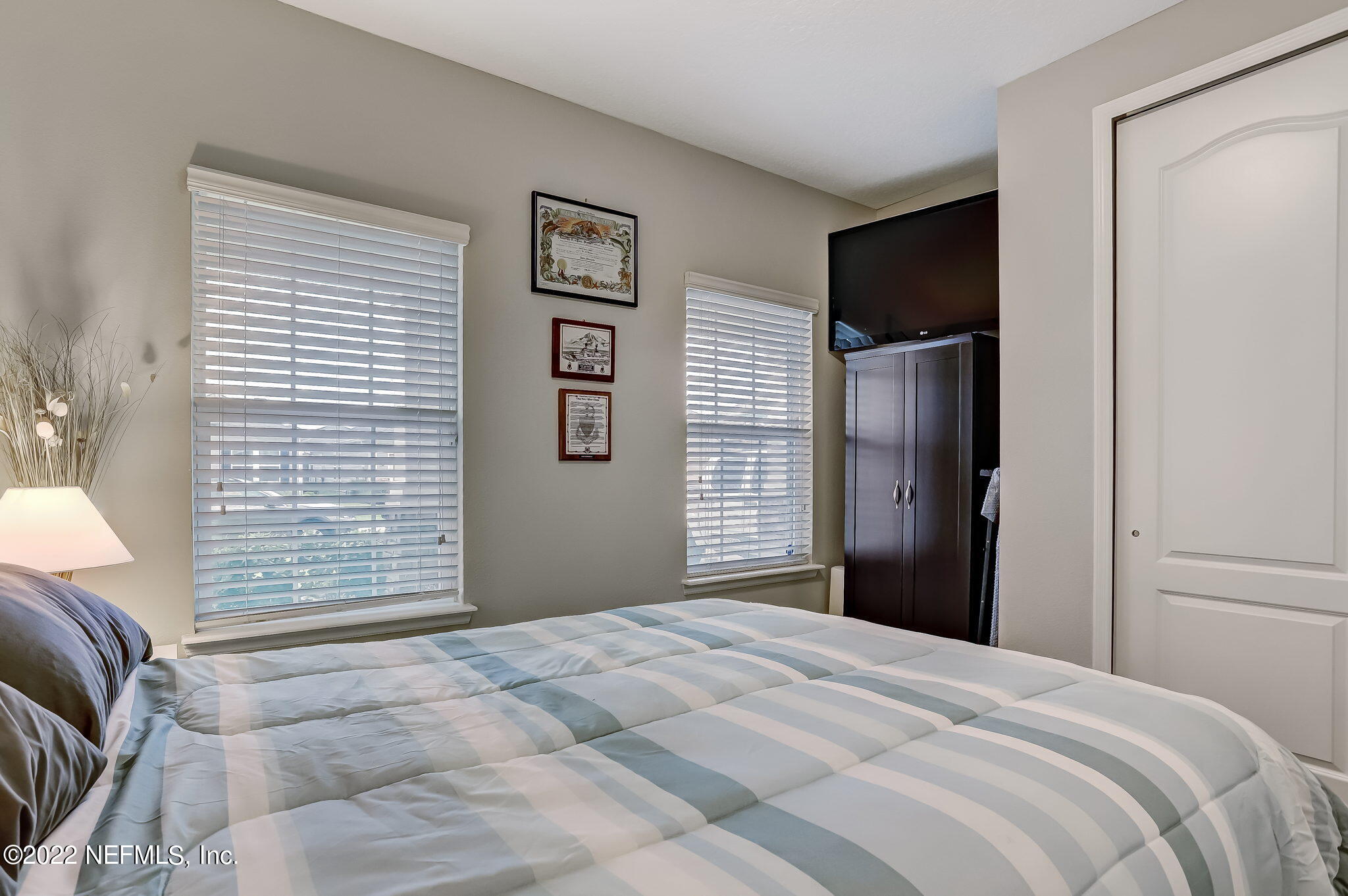 2564 Alexia Circle Jacksonville, FL 32246 - Photo 38 of 67 a bedroom with a bed and a window