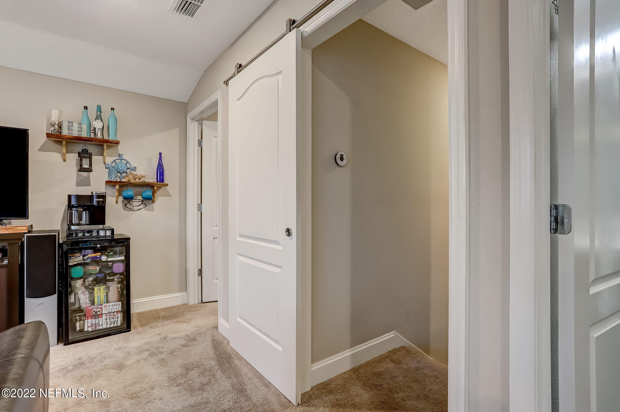 2564 Alexia Circle Jacksonville, FL 32246 - Photo 48 of 67 a view of a kitchen with fridge and workspace