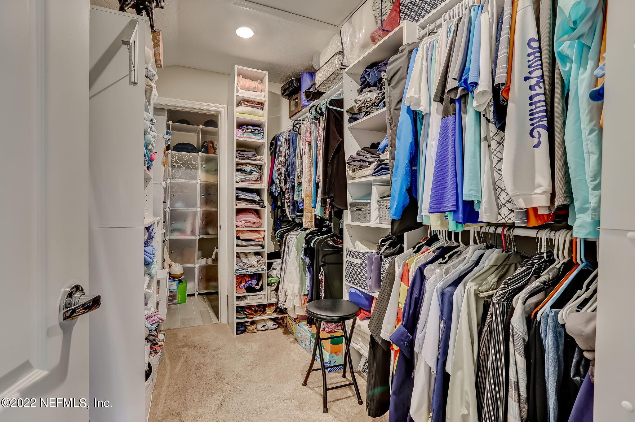 2564 Alexia Circle Jacksonville, FL 32246 - Photo 50 of 67 a view of walk in closet with clothes