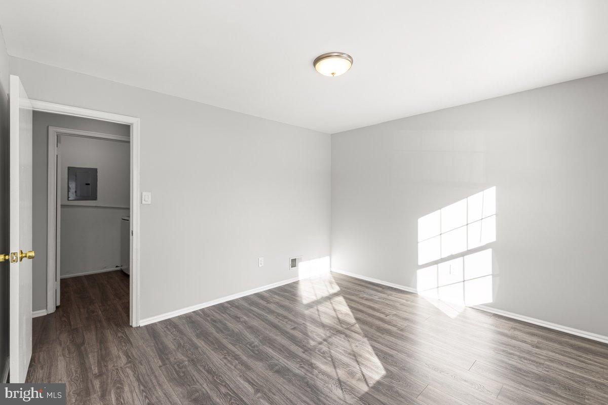 9 Devon Court Robbinsville, NJ 08691 - Photo 12 of 22 an empty room with wooden floor and windows