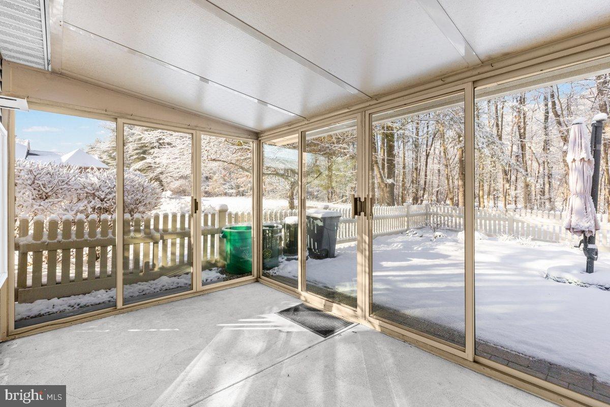 9 Devon Court Robbinsville, NJ 08691 - Photo 17 of 22 a view of an empty room and wooden floor