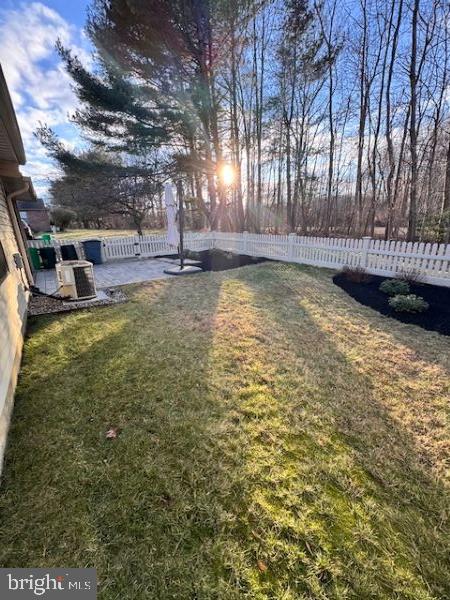 9 Devon Court Robbinsville, NJ 08691 - Photo 20 of 22 a view of yard with swimming pool and trees