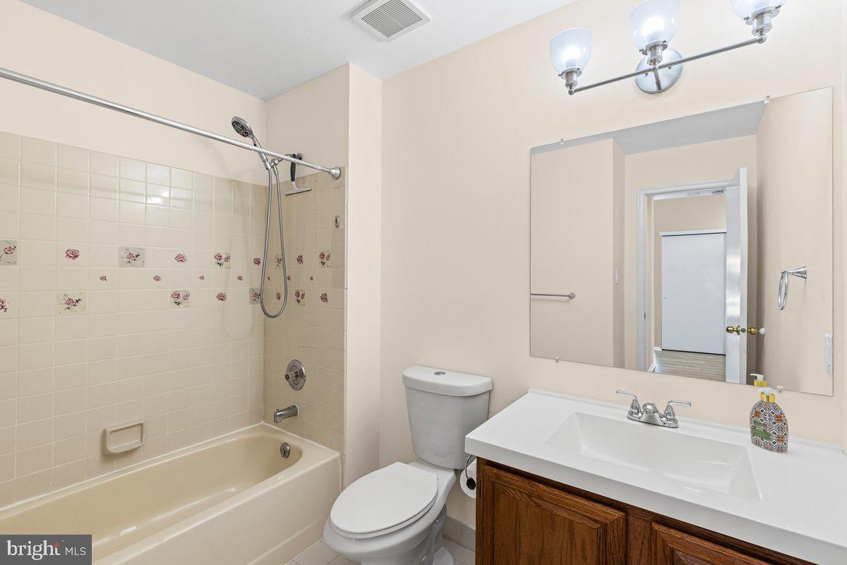 9 Devon Court Robbinsville, NJ 08691 - Photo 10 of 22 a bathroom with a sink a toilet and shower