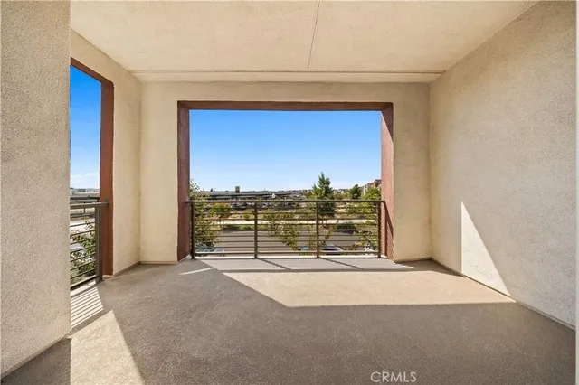 a view of a room with a floor to ceiling window