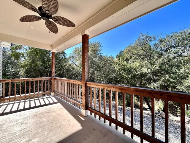 a view of balcony with furniture