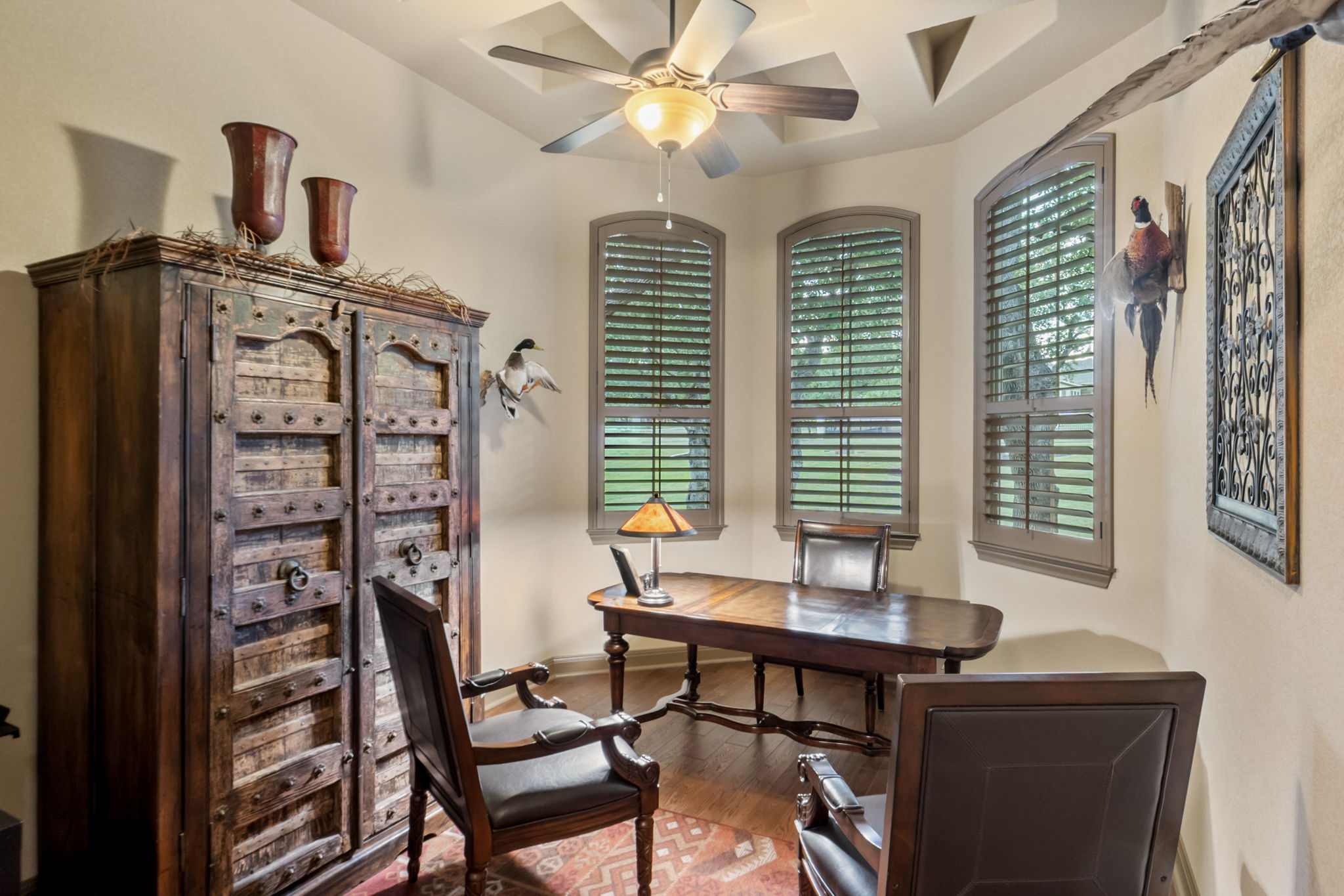 104 Vista Lane Georgetown, TX 78633 - Photo 16 of 36 This home office delivers with bay windows and a sky high patterned ceiling.