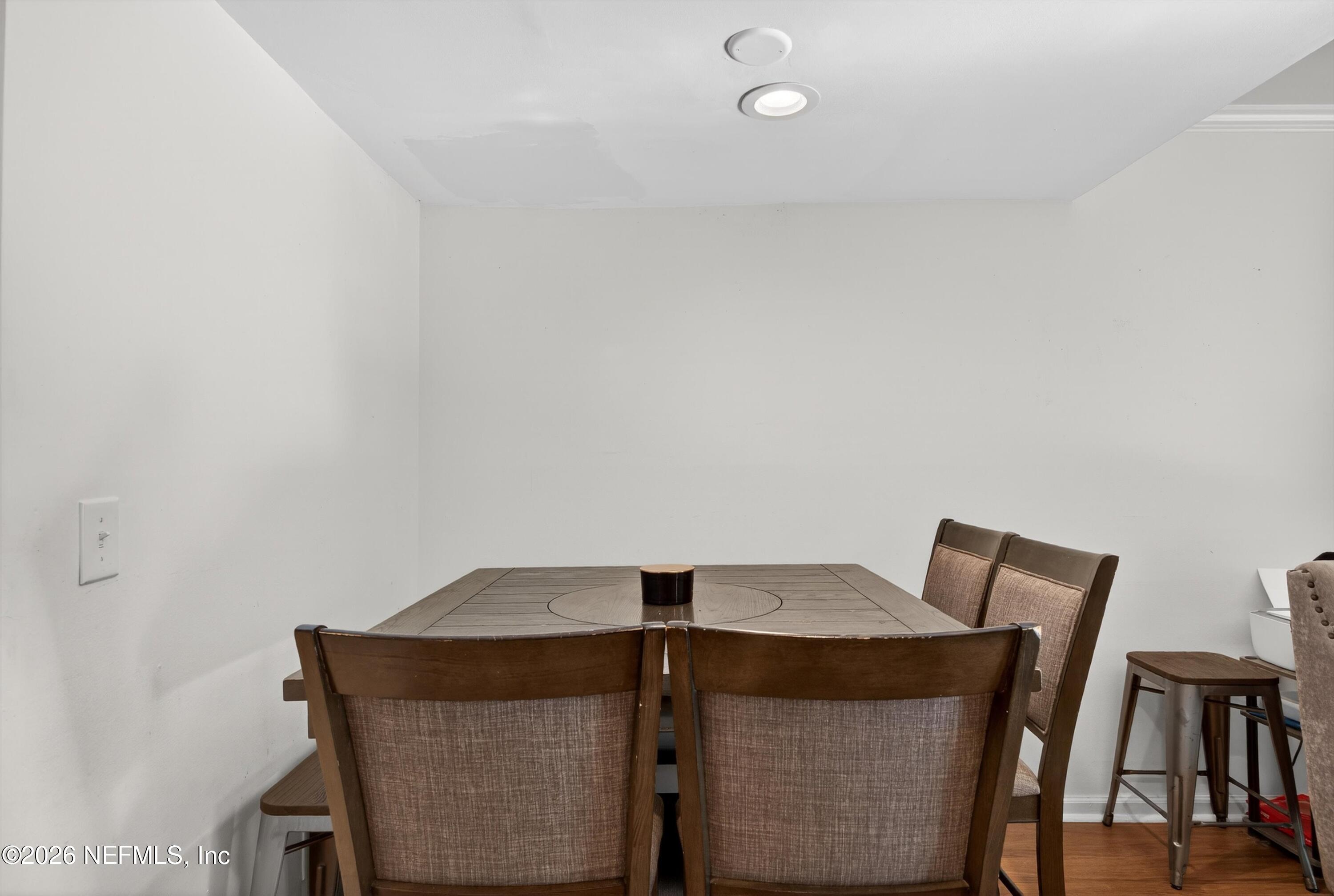 8880 Old Kings Road South, Unit 2 Jacksonville, FL 32257 - Photo 13 of 35 a view of table and chair