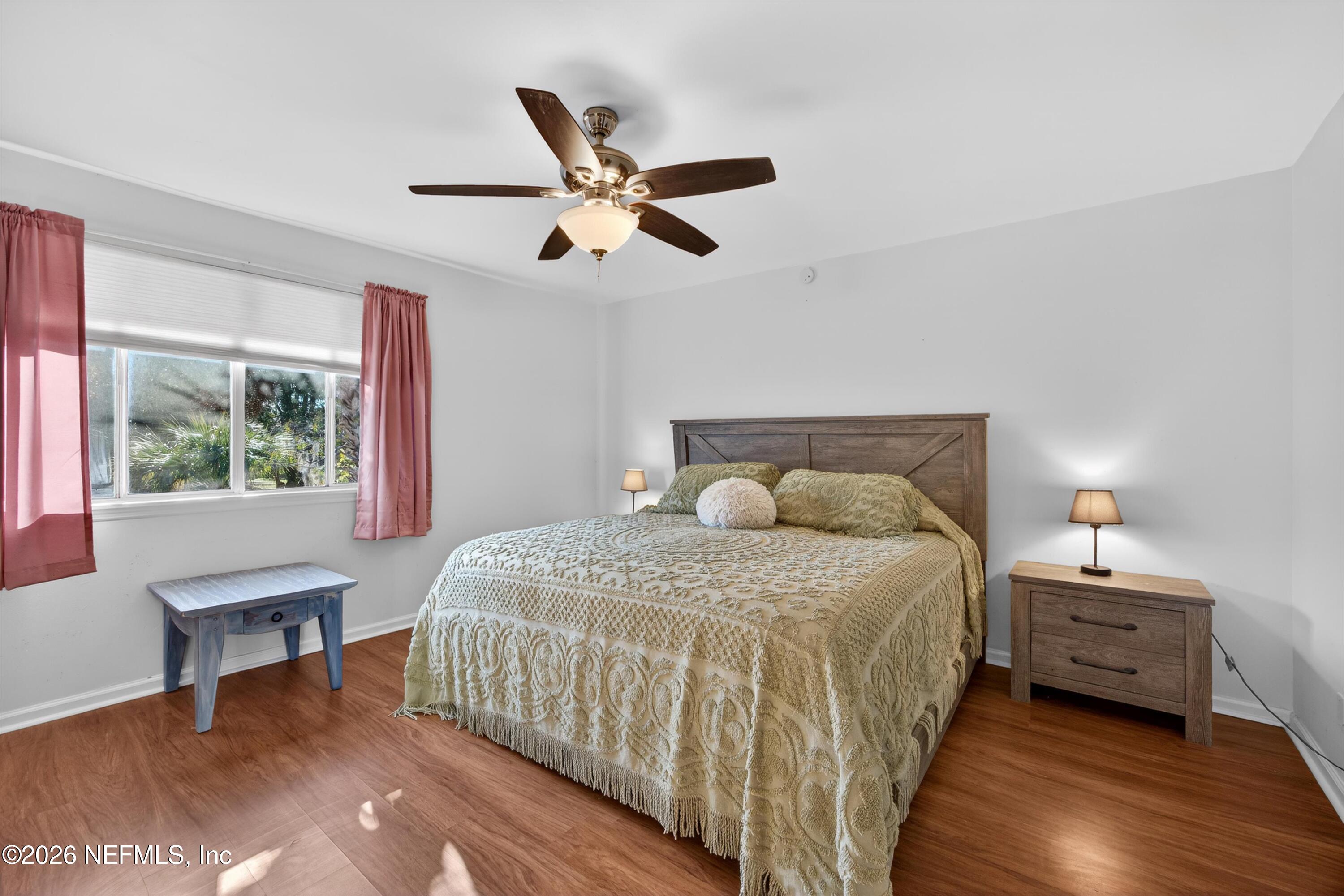 8880 Old Kings Road South, Unit 2 Jacksonville, FL 32257 - Photo 19 of 35 a bedroom with a bed and a window