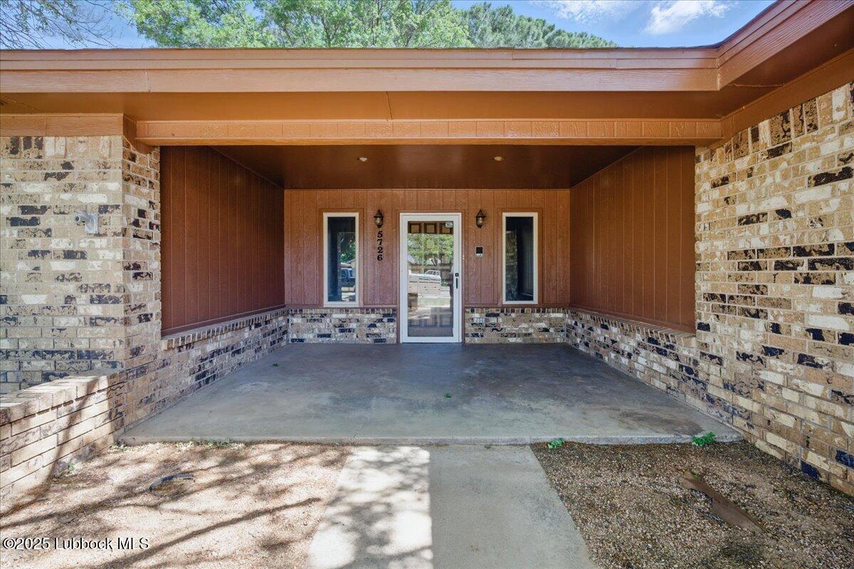 5726 67th Street Lubbock, TX 79424 - Photo 2 of 26 a view of front door of house