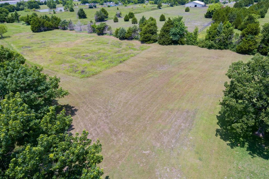 7 Greenfield Way Lucas, TX 75098 - Photo 3 of 16 Aerial view of property's location featuring rural landscape