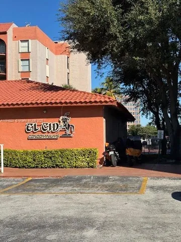 a view of a street with cars