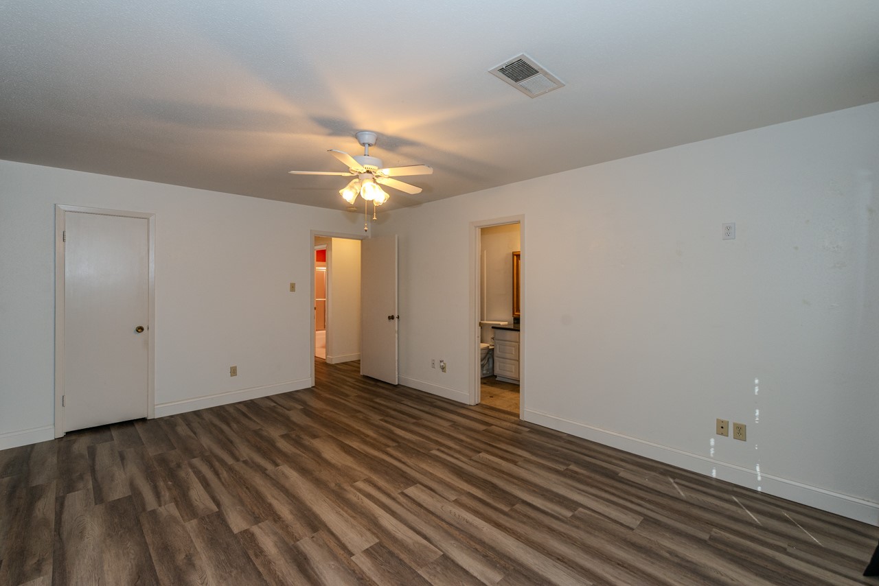 5975 Meadow Way Beaumont, TX 77707 - Photo 12 of 18 wooden floor in an empty room