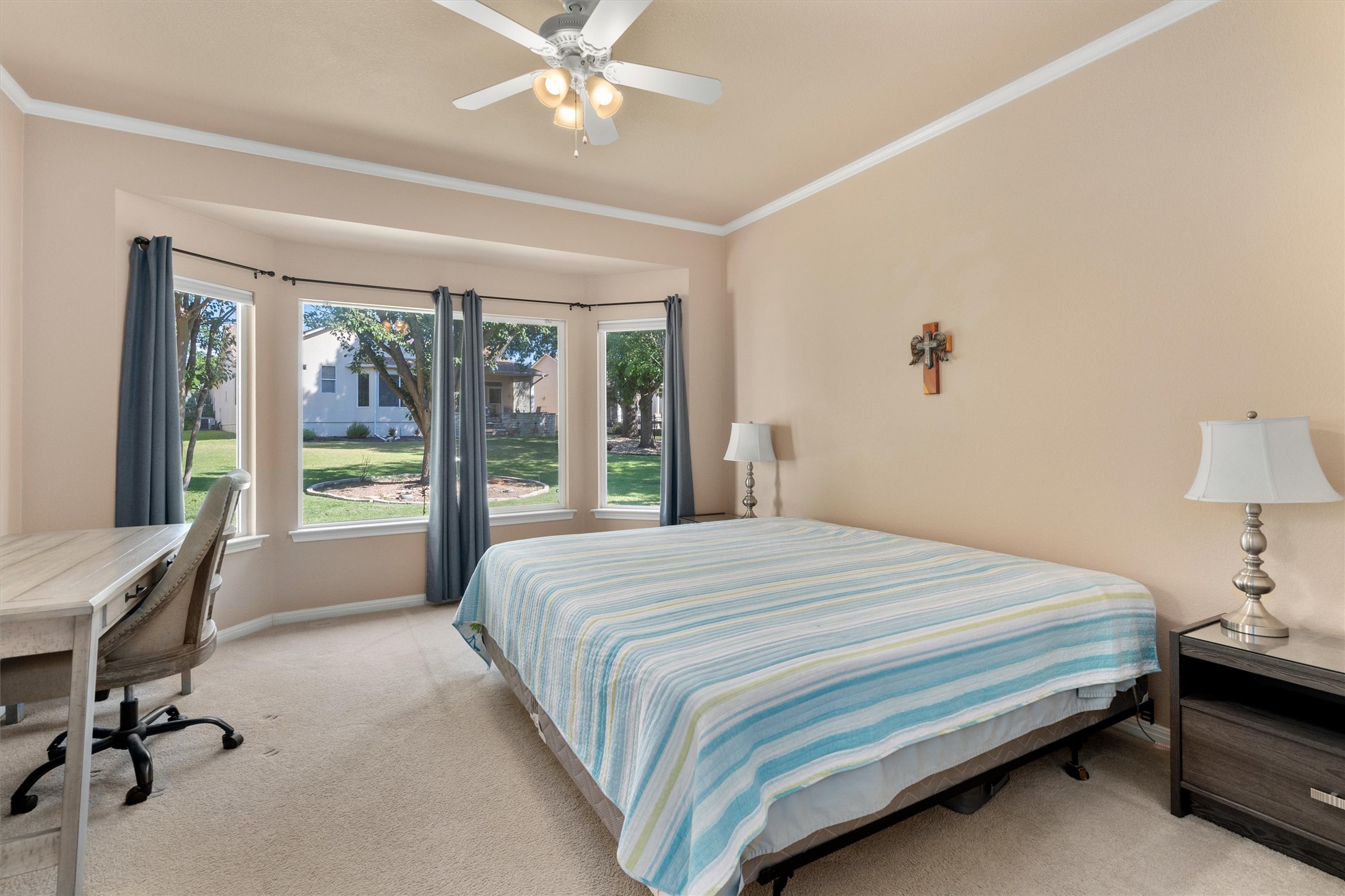 272 Red Poppy Trail Georgetown, TX 78633 - Photo 14 of 29 a bedroom with a bed and a large window