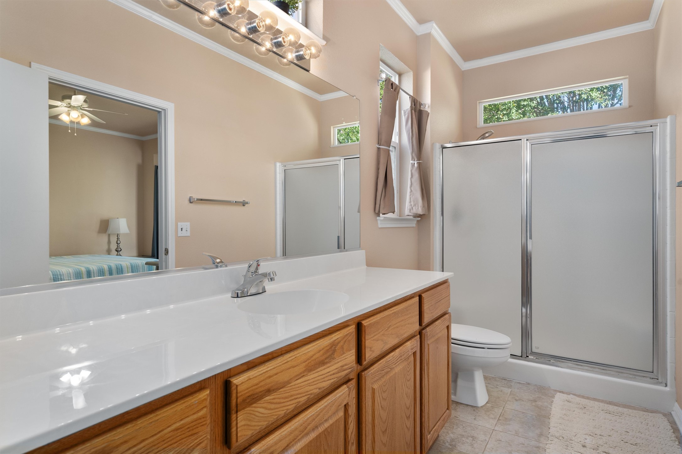 272 Red Poppy Trail Georgetown, TX 78633 - Photo 16 of 29 a bathroom with a sink a toilet and shower