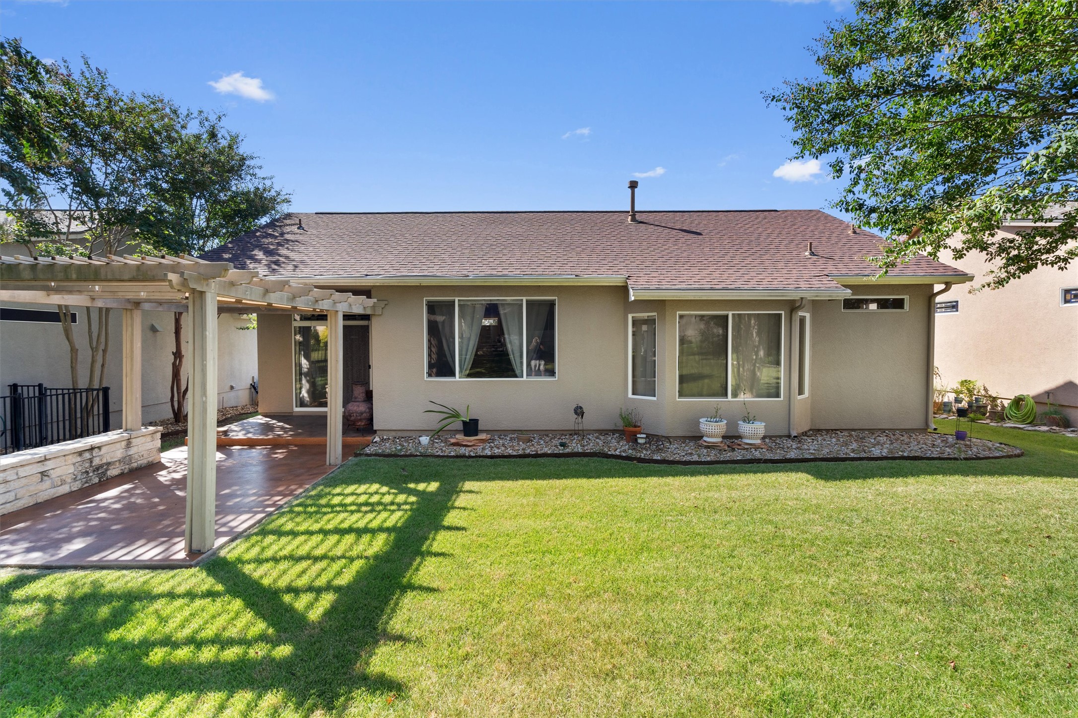 272 Red Poppy Trail Georgetown, TX 78633 - Photo 26 of 29 a view of a house with a yard and swimming pool
