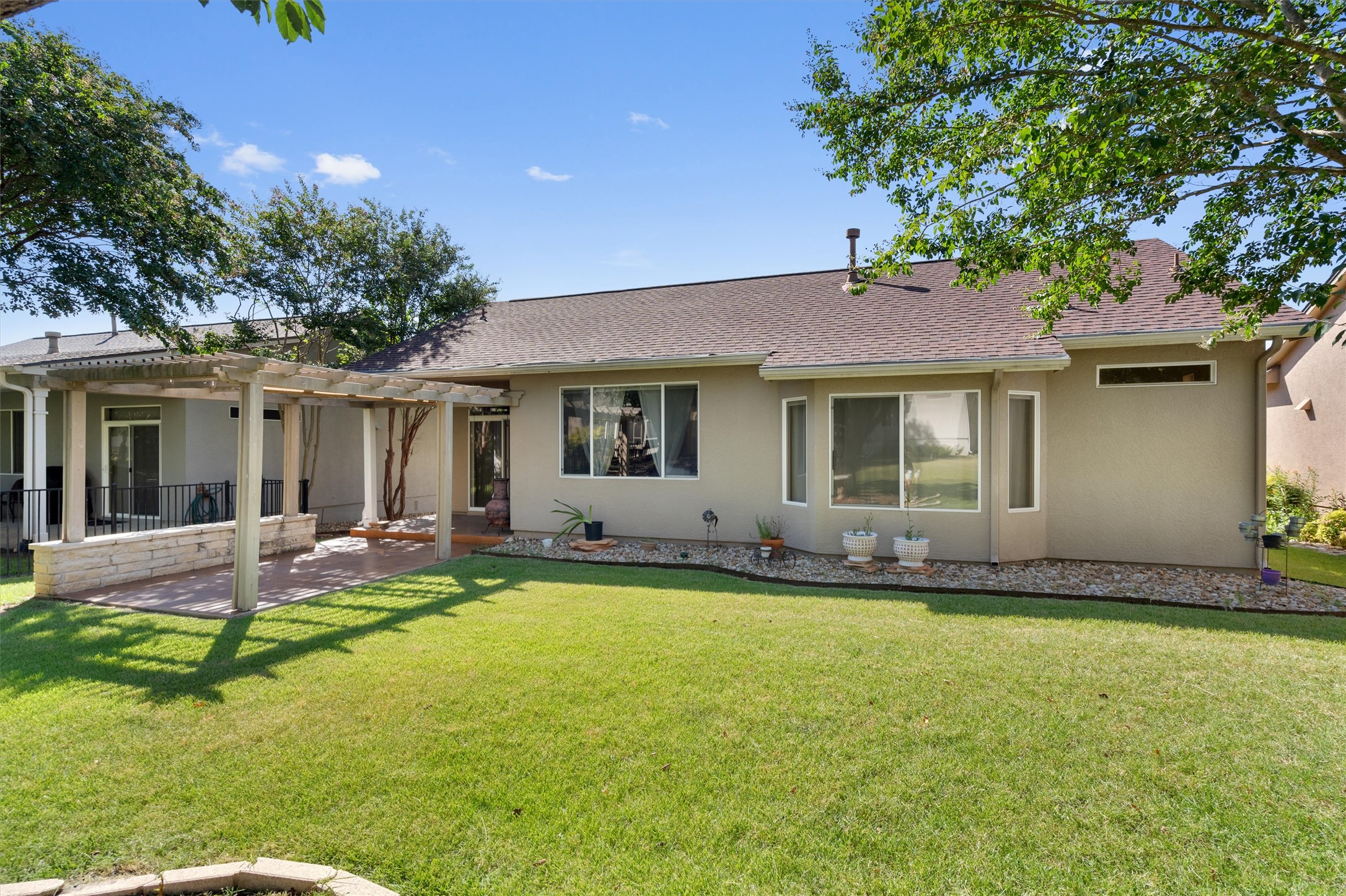 272 Red Poppy Trail Georgetown, TX 78633 - Photo 27 of 29 a house that has a big yard in front of it