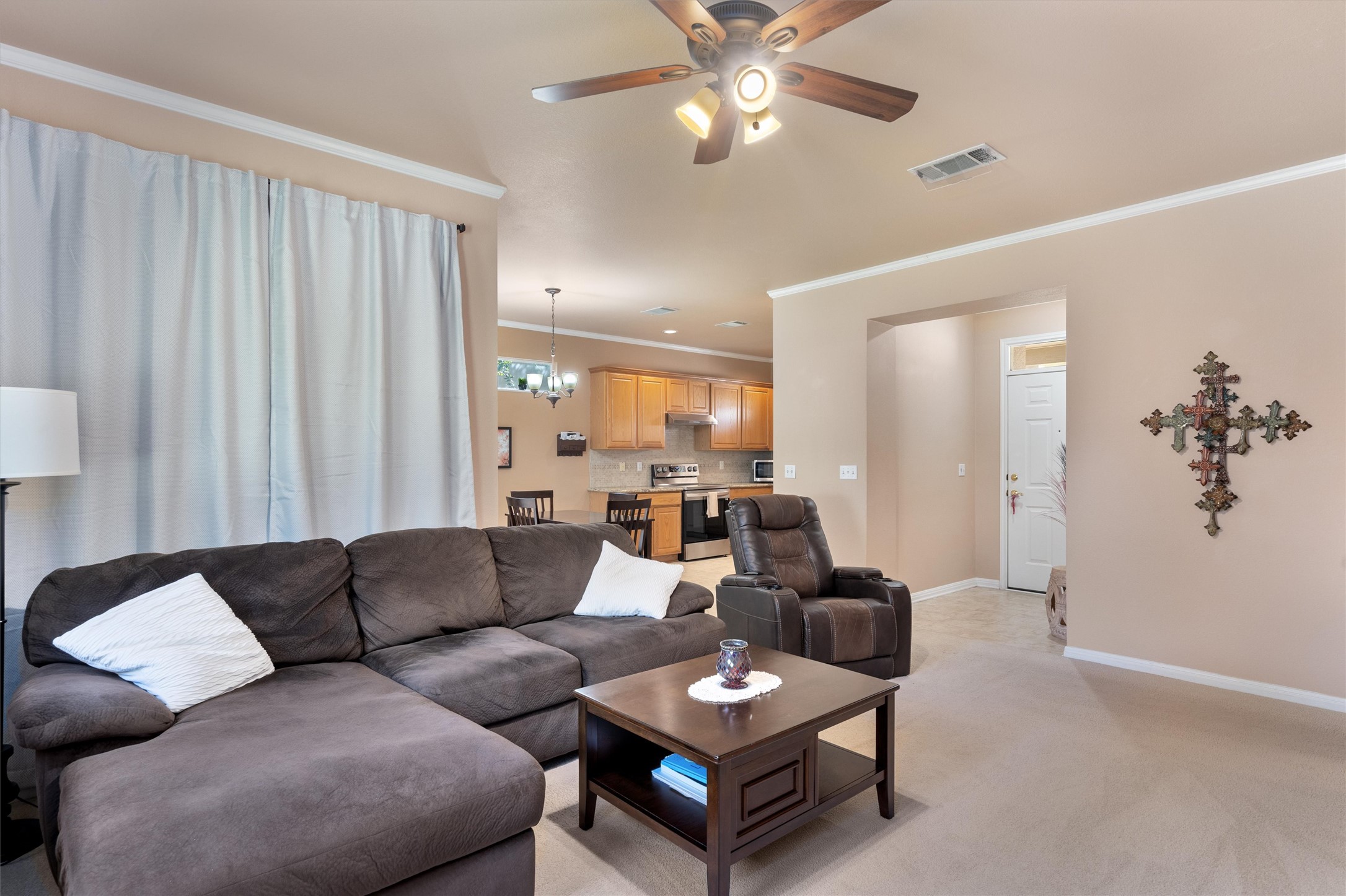 272 Red Poppy Trail Georgetown, TX 78633 - Photo 6 of 29 a living room with furniture and a large window
