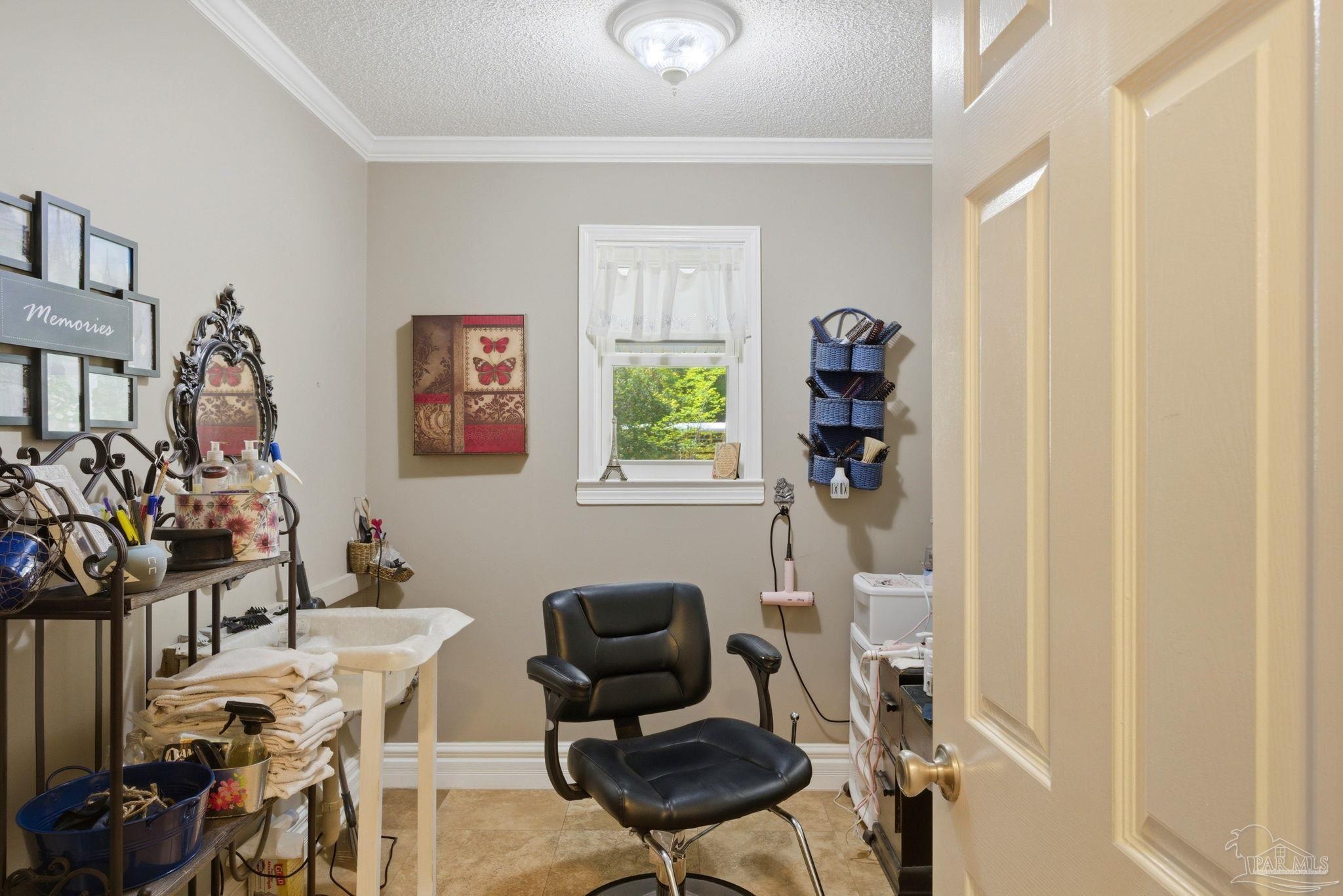 6930 Summit Way Milton, FL 32570 - Photo 23 of 71 a view of a workspace with furniture and a window